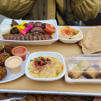 Mazra - Deluxe Kebab Pack steak/lamb, Hummus, Baba Ghanoush - Middle Eastern Near Me - San Bruno, California Mazra - Deluxe Kebab Pack steak/lamb, Hummus, Baba Ghanoush - Middle Eastern Near Me - San Bruno, California