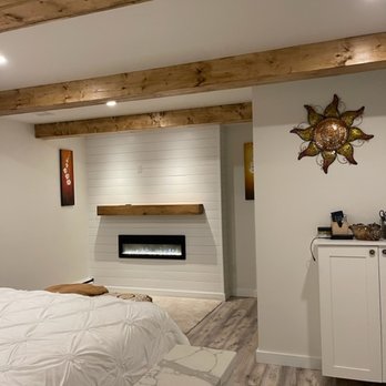 Fleming Contracting - Fireplace wall in master bedroom. - Roofing Near Me - New Kensington , Pennsylvania