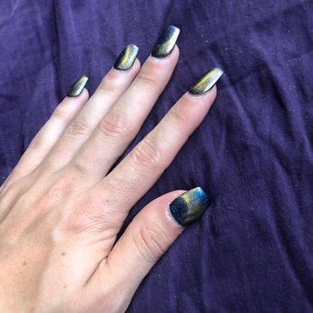 Amanda's Nail & Spa - medium acrylic nails with nail polish under a magnet to get the yellowish green ray over the blue polish - Nail Salons Near Me - Eugene, Oregon Amanda's Nail & Spa - medium acrylic nails with nail polish under a magnet to get the yellowish green ray over the blue polish - Nail Salons Near Me - Eugene, Oregon