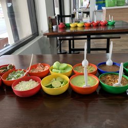 Asadero Acatlan de Juarez - Complimentary condiments, beans and grill peppers and onions on each table.