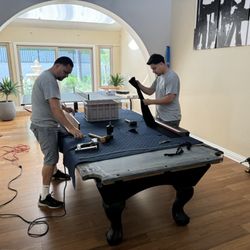 Generation Billiards - Frank and his brother setting up table