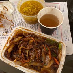 a tray of food and a cup of tea a tray of food and a cup of tea