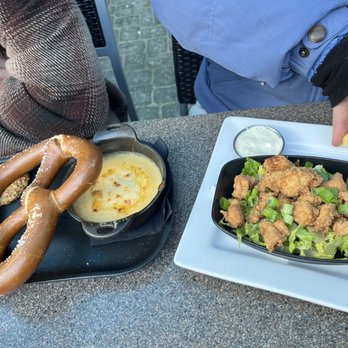 Dubh Linn Gate - Pretzel with cheese and popcorn chicken - Irish Pub Near Me - Whistler, British Columbia Dubh Linn Gate - Pretzel with cheese and popcorn chicken - Irish Pub Near Me - Whistler, British Columbia