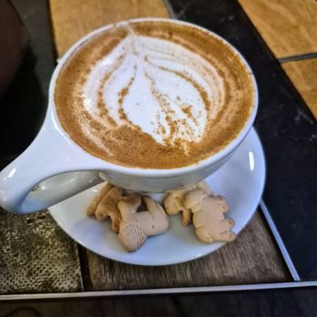 Halcyon - My brown sugar cinnamon almond milk latte was served with animal cookies - Breakfast & Brunch Near Me - Dallas, Texas