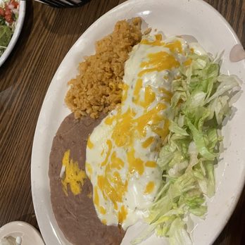 Amigos - Chicken Burrito with Queso on top - Mexican Near Me - Eureka Springs, Arkansas Amigos - Chicken Burrito with Queso on top - Mexican Near Me - Eureka Springs, Arkansas