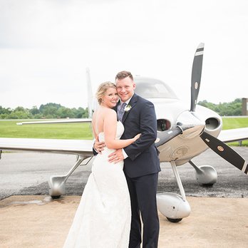 Creative Image Weddings - Bride and groom by airplane at West Chester Helicopter Museum - Event Photography Near Me