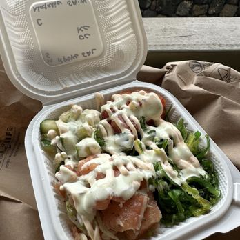 Koloa Fish Market - Korean ahi + salmon poke topped with seaweed salad, spicy cucumber and the spicy mayo + wasabi toppings all so good! - Seafood Markets Near Me - Koloa, Hawaii
