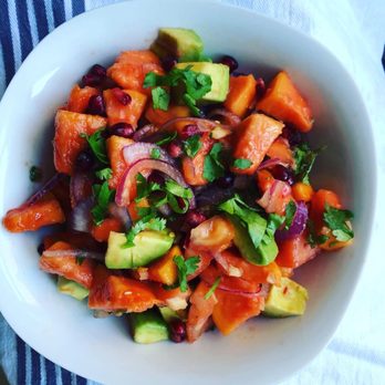 Plant Powered Chefs - Plant-based Papaya salad with avocado, tomato, red onion, cilantro in lemon dressing - Caterers Near Me Plant Powered Chefs - Plant-based Papaya salad with avocado, tomato, red onion, cilantro in lemon dressing - Caterers Near Me