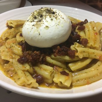 Pasta Louise Cafe - Pasta with spicy red pesto sauce, crispy prosciutto, and burrata. - Italian Near Me - Brooklyn, New York Pasta Louise Cafe - Pasta with spicy red pesto sauce, crispy prosciutto, and burrata. - Italian Near Me - Brooklyn, New York