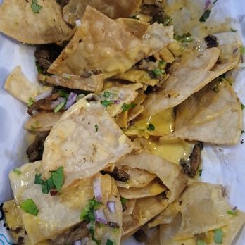 SALT Sea & Land Tacos - Loaded nachos with pork - Seafood Near Me - Tempe, Arizona