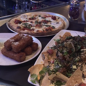 Yard House - Happy hour pizza, Mac n cheese bites, and ahi poke nachos - New American Near Me - Riverside, California Yard House - Happy hour pizza, Mac n cheese bites, and ahi poke nachos - New American Near Me - Riverside, California