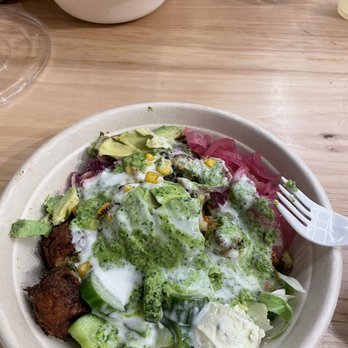 CAVA - Lentil Avocado Bowl: greens, cabbage, broccoli, falafel, olives, hummus, baba ghanoush, herbs, brown rice, Soooo good. 2.15.23 - Mediterranean Near Me - Pasadena, California