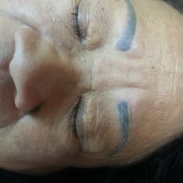 LEFT BROW (BEFORE) is thick & blue-blackish. RIGHT BROW (preliminary AFTER) she has narrowed & added more arch to mom's brow. LEFT BROW (BEFORE) is thick & blue-blackish. RIGHT BROW (preliminary AFTER) she has narrowed & added more arch to mom's brow.