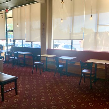 Cafe Noir - Lots of seating, including a sofa in front of a fireplace, spread out in sectioned rooms for more privacy & easier social distancing - Cafes Near Me - Federal Way, Washington