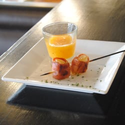 Whitecaps - Prosciutto wrapped scallop with apricot horseradish chutney