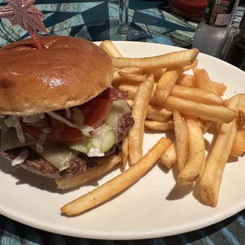 Margaritaville - Boston - Rancho deluxe, comes with a pickle (hidden behind the burger) - Sports Bars Near Me - Boston, Massachusetts