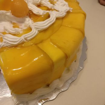 Lucullus Bakers & Roasters - Mango mousse cake, parts of the mango were slightly brown. - Coffee Roasteries Near Me - Markham, Ontario Lucullus Bakers & Roasters - Mango mousse cake, parts of the mango were slightly brown. - Coffee Roasteries Near Me - Markham, Ontario