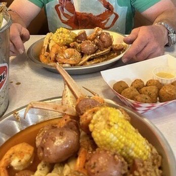 Crab & Shell Cajun Seafood - Boil Combo 3, snow crab, shrimp, sausage, corn, potatoes with house blend sauce and must have hush puppies - Cajun/Creole Near Me - Denver, Colorado
