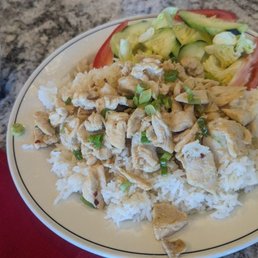 Sauteed chicken with lemongrass and mild sauce on side. Sauteed chicken with lemongrass and mild sauce on side.