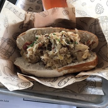 King's BierHaus - German Bratwurst with sauerkraut in a pretzel bun - German Near Me - Dickinson, Texas King's BierHaus - German Bratwurst with sauerkraut in a pretzel bun - German Near Me - Dickinson, Texas