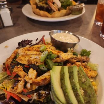 Forrester's Bar and Grill - Southwest Salad with taco salad in back - New American Near Me - Eugene, Oregon Forrester's Bar and Grill - Southwest Salad with taco salad in back - New American Near Me - Eugene, Oregon