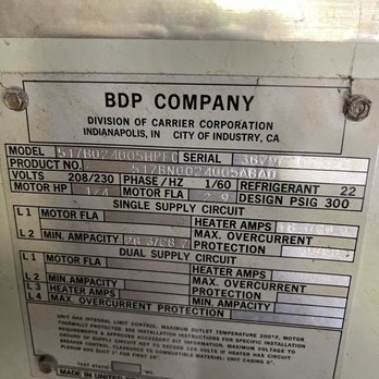 WestCold Services - This is the details - The image shows a metal identification plate attached to HVAC equipment by BDP Company, based in Indianapolis, CA. The plate includes details such as model number, serial number, voltage, phase, refrigerant type, motor horsepower, and electrical circuit information. It also contains safety and installation instructions, along with manufacturing details indicating it was made in the United States. - Heating & Air Conditioning/HVAC Near Me