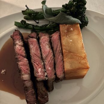 Hyeholde Restaurant - 12 oz Prime Beef Delmonico with Mille-Feuille Potatoes and broccolini - New American Near Me - Coraopolis, Pennsylvania Hyeholde Restaurant - 12 oz Prime Beef Delmonico with Mille-Feuille Potatoes and broccolini - New American Near Me - Coraopolis, Pennsylvania