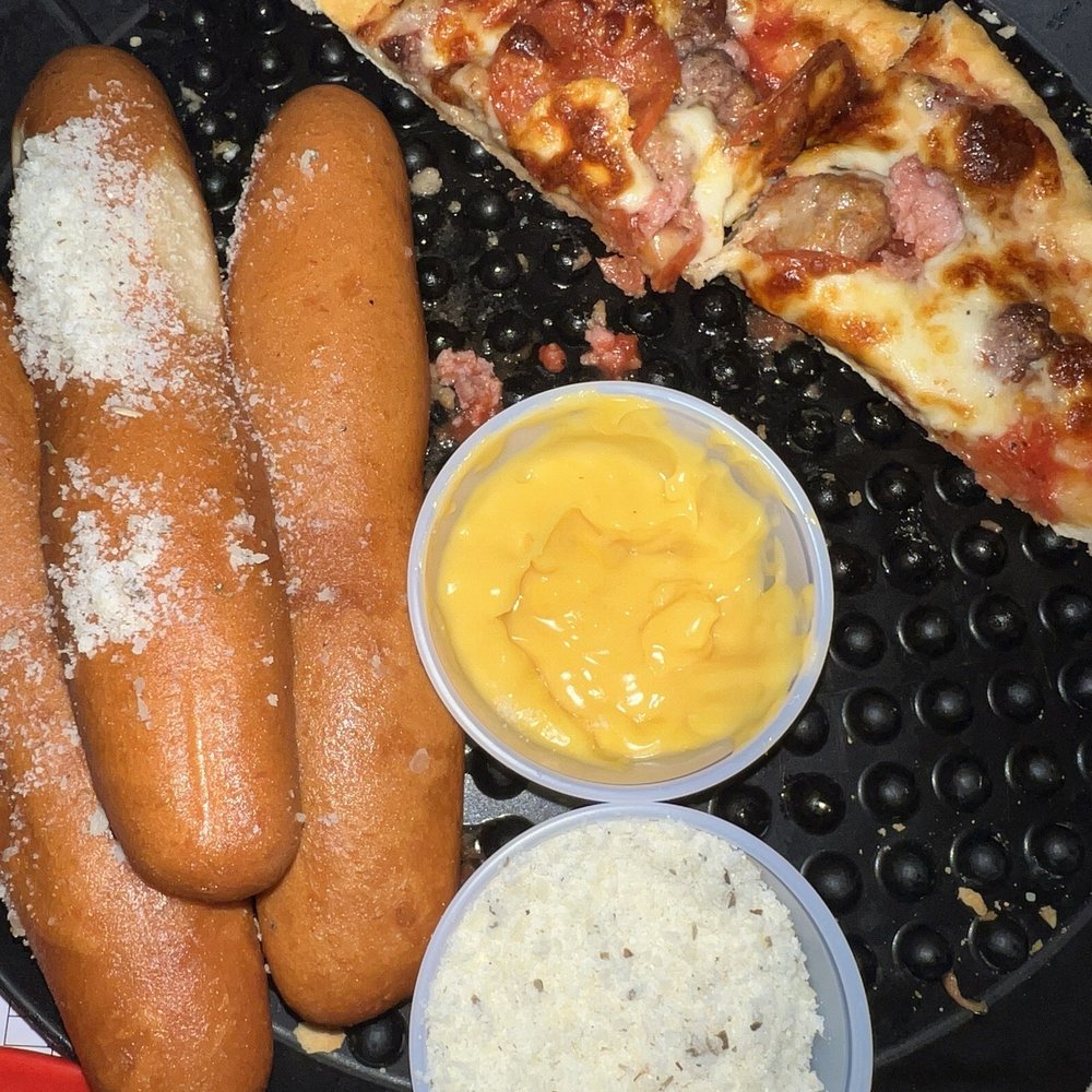 Nasty hard bread sticks that are 1.75 EACH!!!! Canned cheese that tastes like plastic. Canned Parmesan cheese. Nasty hard bread sticks that are 1.75 EACH!!!! Canned cheese that tastes like plastic. Canned Parmesan cheese.