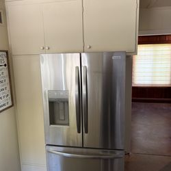 WDC Kitchen & Bath - Unable to open my upper cabinets due to the fridge being too tall