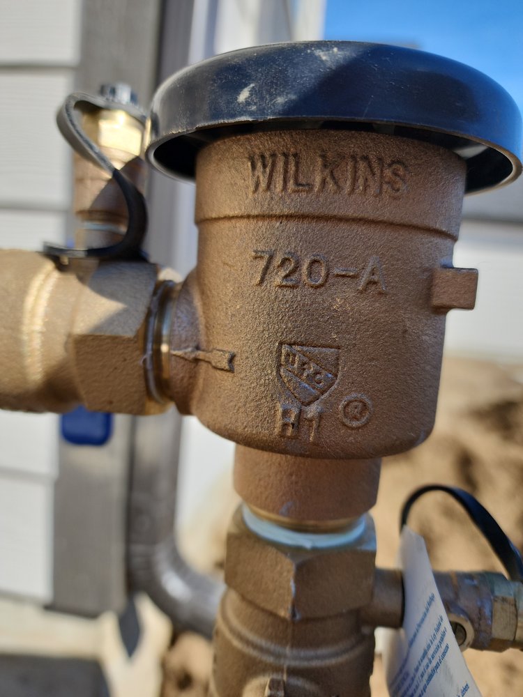 Slide of M & H Backflow
