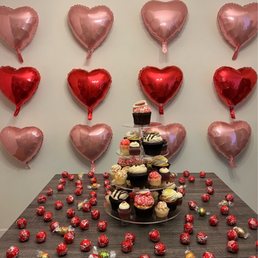 a tower of heart shaped balloons