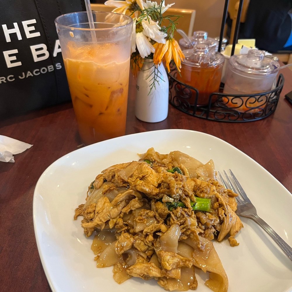 Lemongrass Thai Restaurant - a plate of food on a table - Thai Near Me - Raleigh, North Carolina Lemongrass Thai Restaurant - a plate of food on a table - Thai Near Me - Raleigh, North Carolina