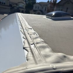 On The Spot RV & Trailer Repair - The Rotted wood was replaced a new roof cover and caulking.