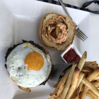 Ocean Hai - Deliciously decadent burger - there is avocado hiding under the burger hiding under the egg w/ kimchi picked and aioli. - New American Near Me - Clearwater Beach, Florida Ocean Hai - Deliciously decadent burger - there is avocado hiding under the burger hiding under the egg w/ kimchi picked and aioli. - New American Near Me - Clearwater Beach, Florida