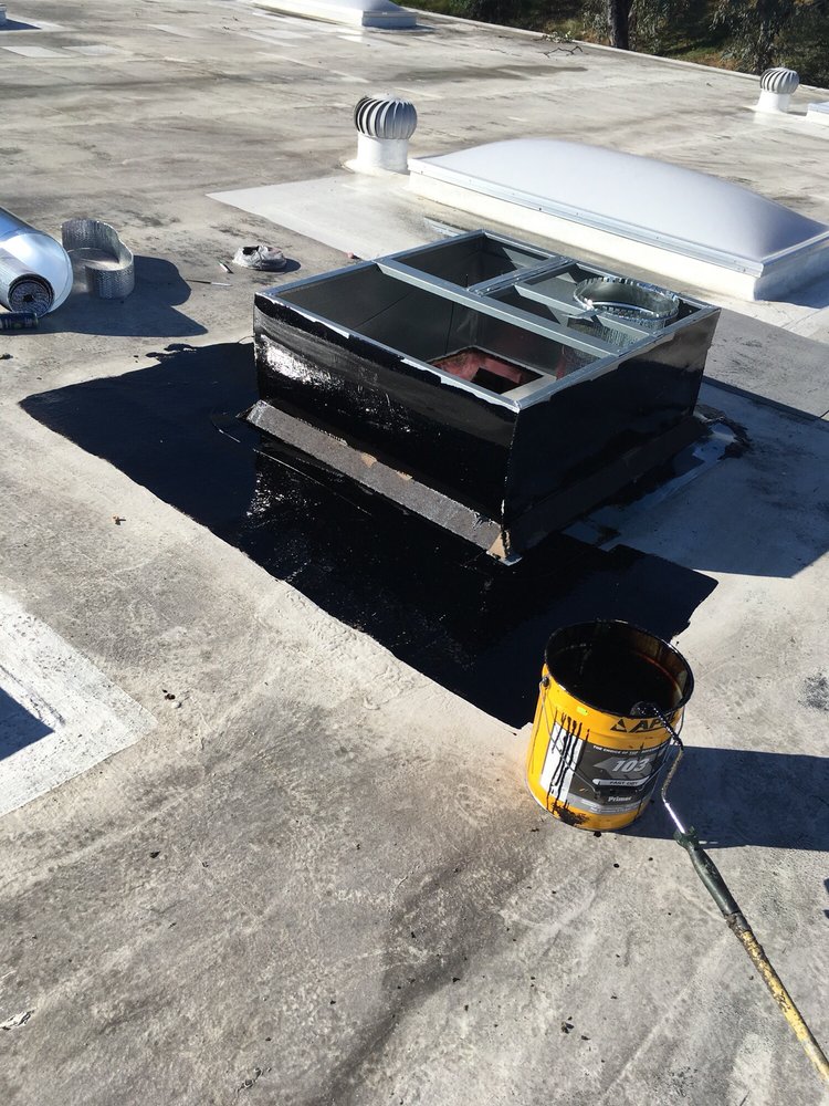 Slide of Vulcan Roofing Co