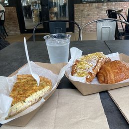 Quiche and croissants outside on the patio
