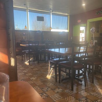 Casa Charro - a view of a dining room with tables and chairs - Mexican Near Me - Crystal City, Missouri