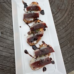 Crostini with whipped burrata, arugula pesto, charred peach, and balsamic-port-cherry reduction Crostini with whipped burrata, arugula pesto, charred peach, and balsamic-port-cherry reduction