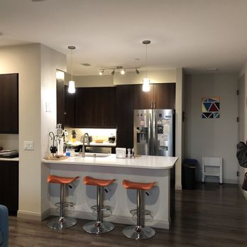 Core at Sycamore Highlands - Open concept from kitchen into living room - Apartments Near Me - Riverside, California Core at Sycamore Highlands - Open concept from kitchen into living room - Apartments Near Me - Riverside, California