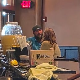Photo of my date and I taken by the bartender Cassandra and then put on blast in FB dating the same person pages