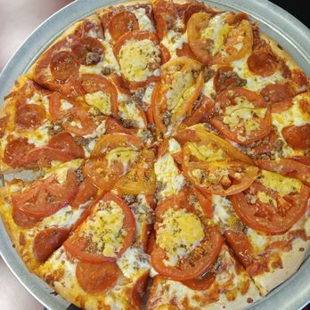 Nima's Pizza & More - Fresh tomatoes, pepperoni, sausage and lots of cheese and spices. Fantastic - Pizza Near Me - Gassville, Arkansas Nima's Pizza & More - Fresh tomatoes, pepperoni, sausage and lots of cheese and spices. Fantastic - Pizza Near Me - Gassville, Arkansas