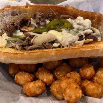 Oyster Pub - Philly Cheesesteak w/TOTS!! - Sports Bars Near Me - Daytona Beach, Florida Oyster Pub - Philly Cheesesteak w/TOTS!! - Sports Bars Near Me - Daytona Beach, Florida