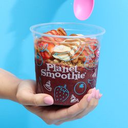 Planet Smoothie - Dig into delicious acai and dragon fruit bowls topped with fresh fruit for a satisfying breakfast or snack on the go.