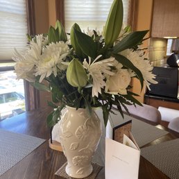 White roses w white Lily's etc White roses w white Lily's etc
