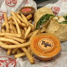 Grilled chicken wrap and fries Grilled chicken wrap and fries