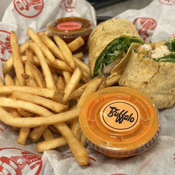 Slim Chickens - Grilled chicken wrap and fries - American Near Me - Celebration, Florida