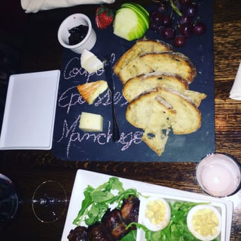 DiWine - These were the apps we ordered. The 3 choice cheese platter and eggs and dates wrapped with bacon. - Wine Bars Near Me - Astoria, New York DiWine - These were the apps we ordered. The 3 choice cheese platter and eggs and dates wrapped with bacon. - Wine Bars Near Me - Astoria, New York
