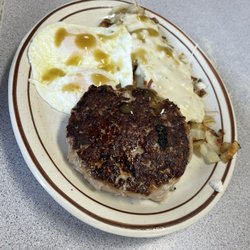 Kevin's Cafe - Sausage patty, 2 eggs over-easy with Tabasco, and smothered hashbrowns @ Kevin's Cafe.