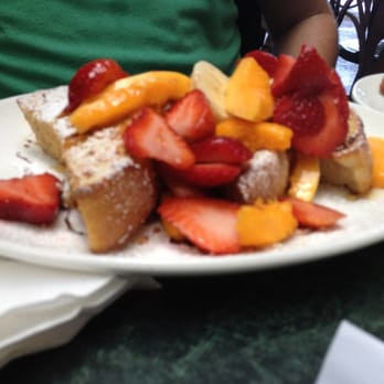 Plums Cafe - coconut French toast with papaya and strawberries - Breakfast & Brunch Near Me - Costa Mesa, California