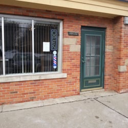 John's Suburban House Hair Fashions - A little storefront between Jefferson Pub & Brioni's.
